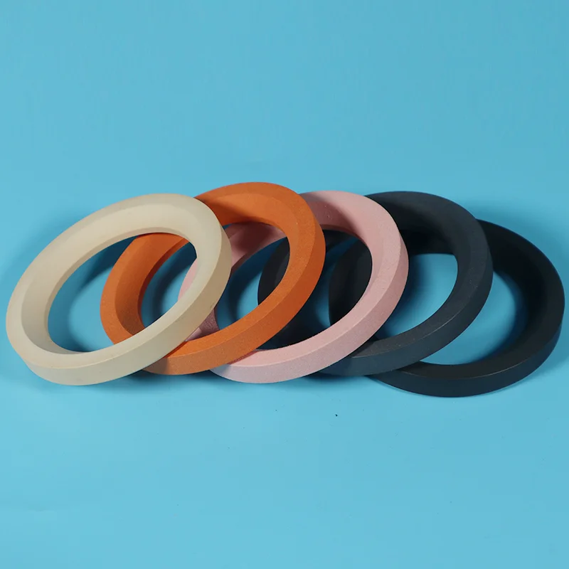 Fylt modifisert PTFE-ventilsete